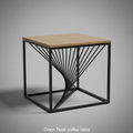 A high-resolution, studio-shot of the Orion Twist coffee table set against a smooth, neutral gray gradient background. The scene is illuminated with softbox lighting, emphasizing the sleek black twisted metal base with subtle reflections and shadows that h