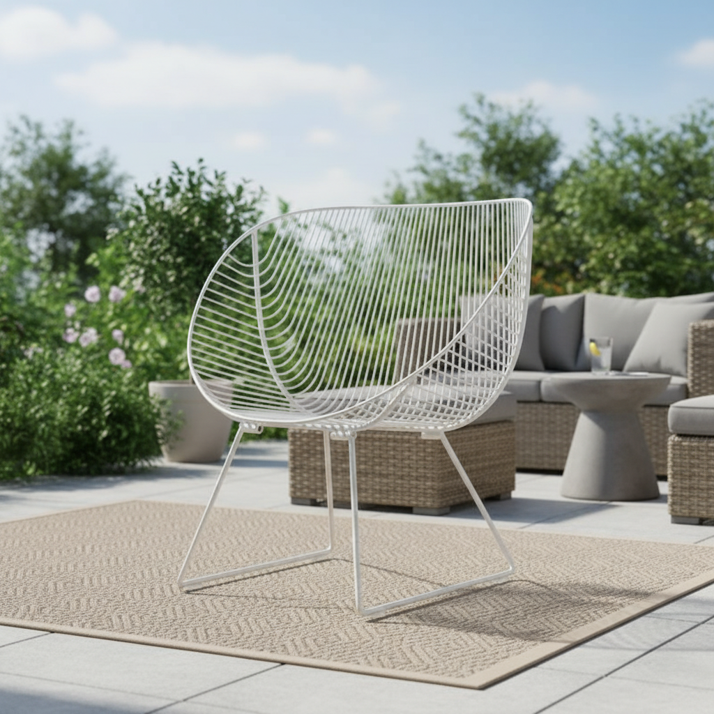 Prompt 2: Create a vivid lifestyle scene featuring the Coromandel Stainless Steel Chair in a bright, airy outdoor patio setting during late morning. The chair is shown from a low-angle shot at a 35mm focal length, emphasizing its sleek contours and the glo