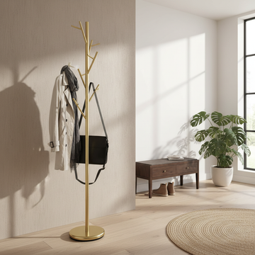 Generate a lifestyle shot featuring the 'Zen in Gold coat rack' in an modern hallway with natural daylight filtering in. Employ HDR studio lighting to ensure clarity and vibrant color tones, showcasing the metal's luminous gold finish and the stable black 