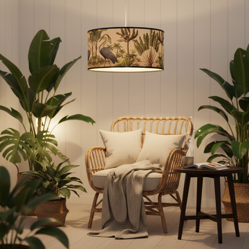 Design a cinematic scene featuring the 'Bamboo Lampshade - Cranes' as the centerpiece suspended above a cozy, tropical-themed reading nook illuminated by HDR studio lighting. Use a camera angle from below, with a 35mm focal length to emphasize the detailed