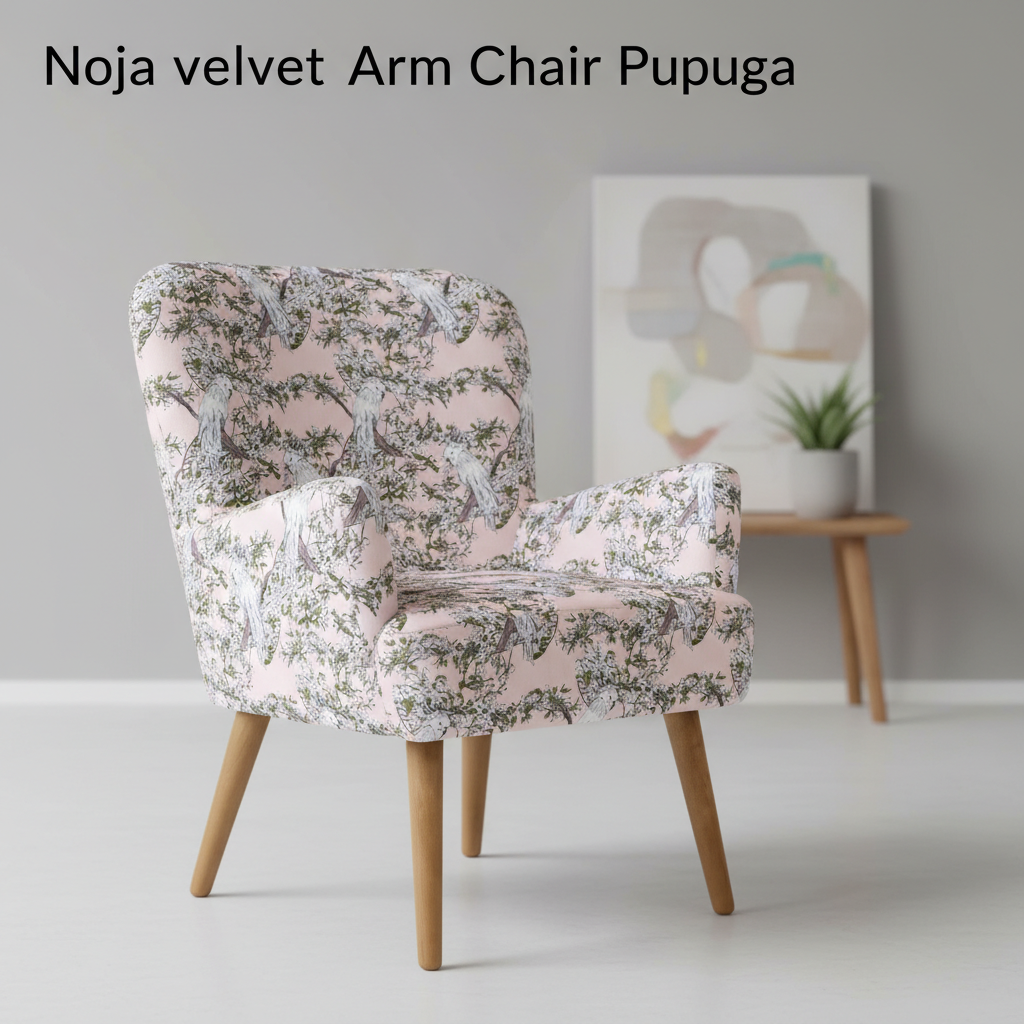 Capture a high-resolution, studio shot of the Noja velvet Arm Chair Pupuga in a modern, minimalist living room setting. Use softbox lighting to highlight the plush velvet upholstery, emphasizing its rich, deep color and luxurious texture. The camera is pos