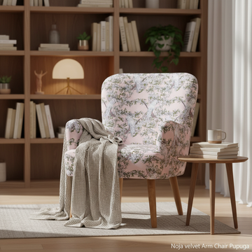 Create a cinematic, lifestyle scene featuring the Noja velvet Arm Chair Pupuga in a stylish, contemporary reading nook. Utilize HDR studio lighting to capture the textures and details of the plush velvet fabric, with a focus on warmth and inviting mood. Th