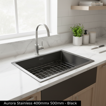 Create a cinematic lifestyle scene featuring the Aurora stainless steel sink in a contemporary kitchen setting. Use natural diffused daylight with rim lighting to highlight the sink’s black matte finish and smooth surfaces. Capture the scene with a wide-an